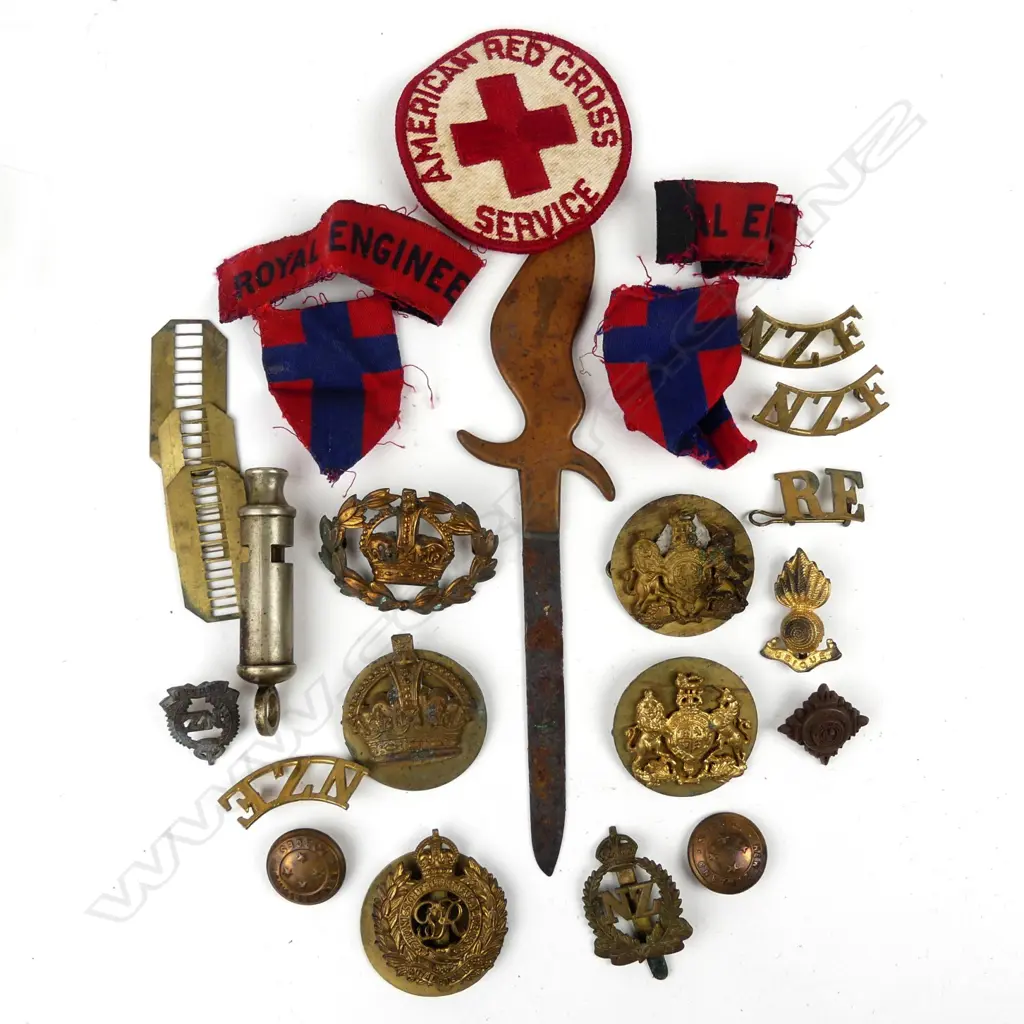 A selection of WWII British and NZ cap and collar badges Image 1++