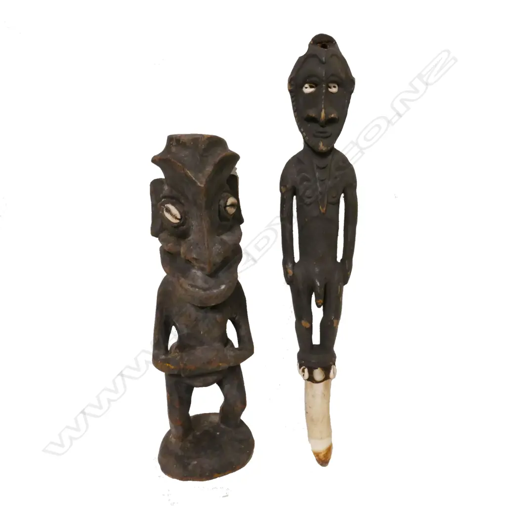 Two small carved PNG figures Image 1++