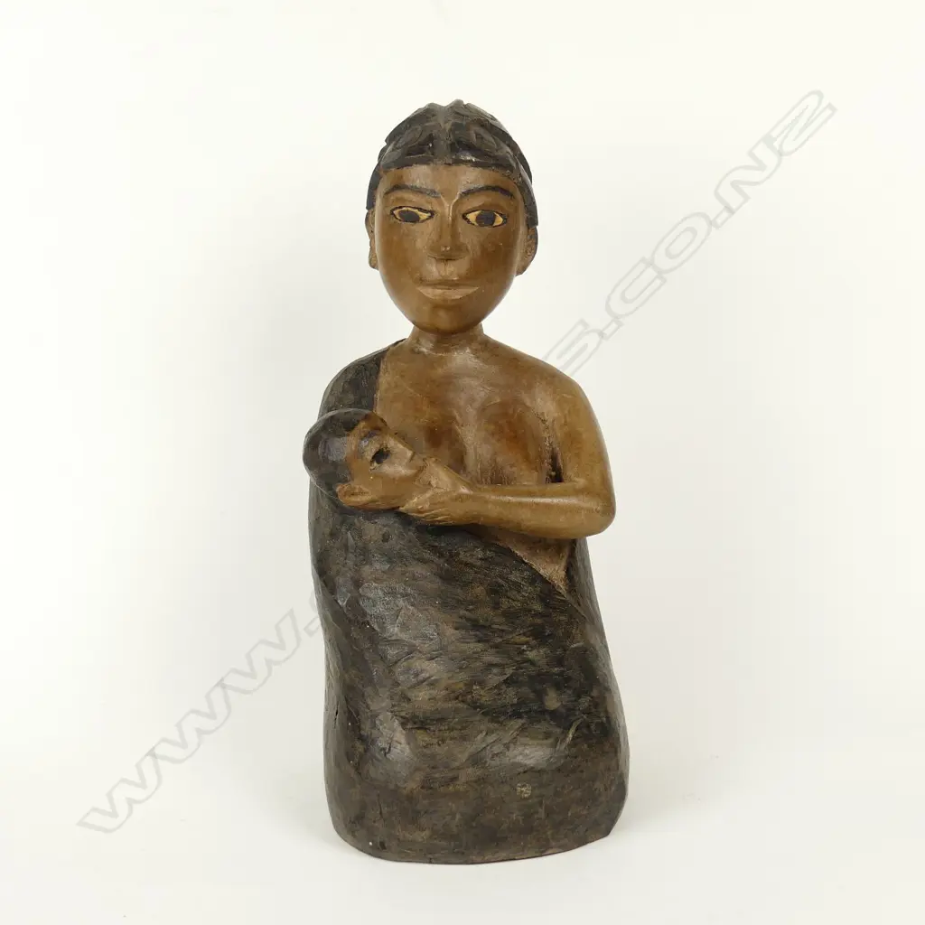 An early 20thC African sculptural wood carving Image 1++