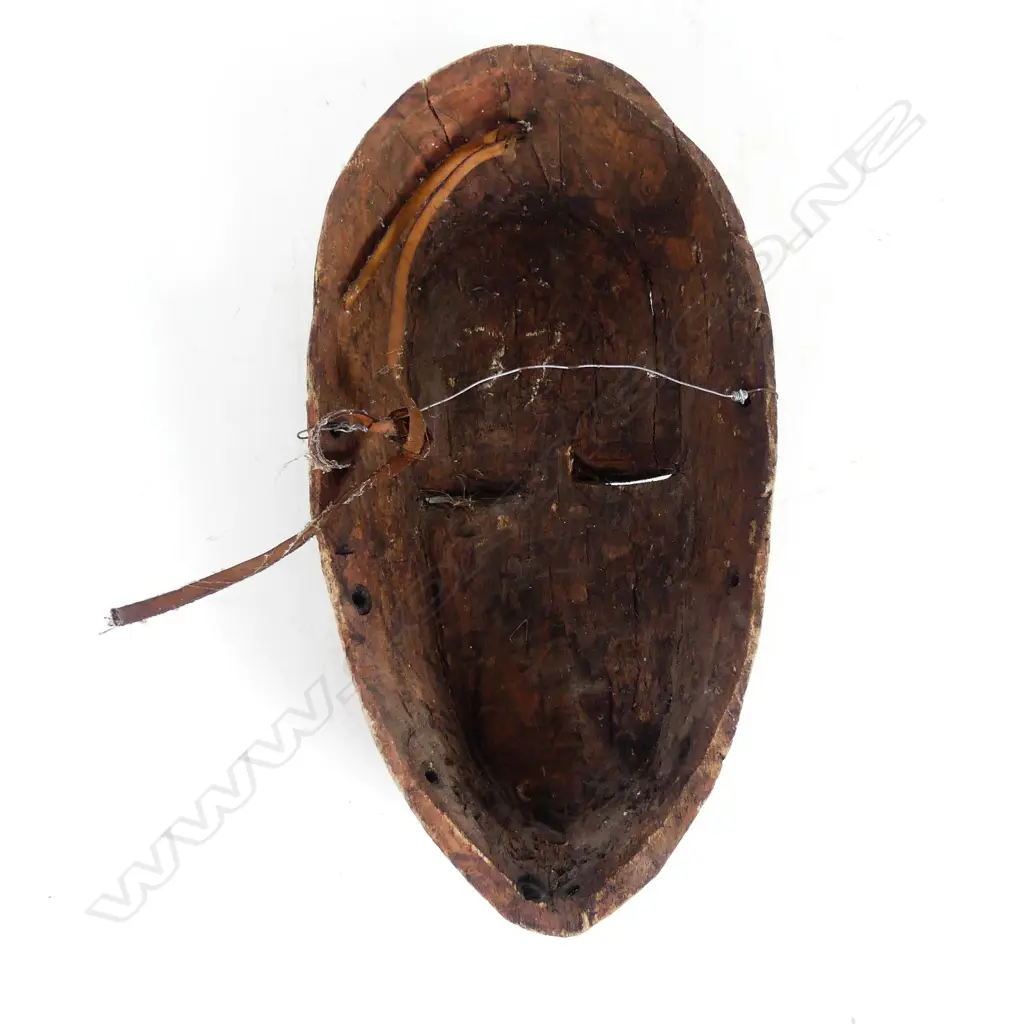 An African carved mask Image 1++