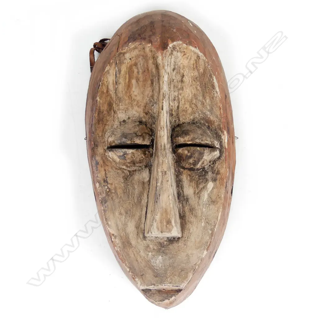 An African carved mask Image 1++