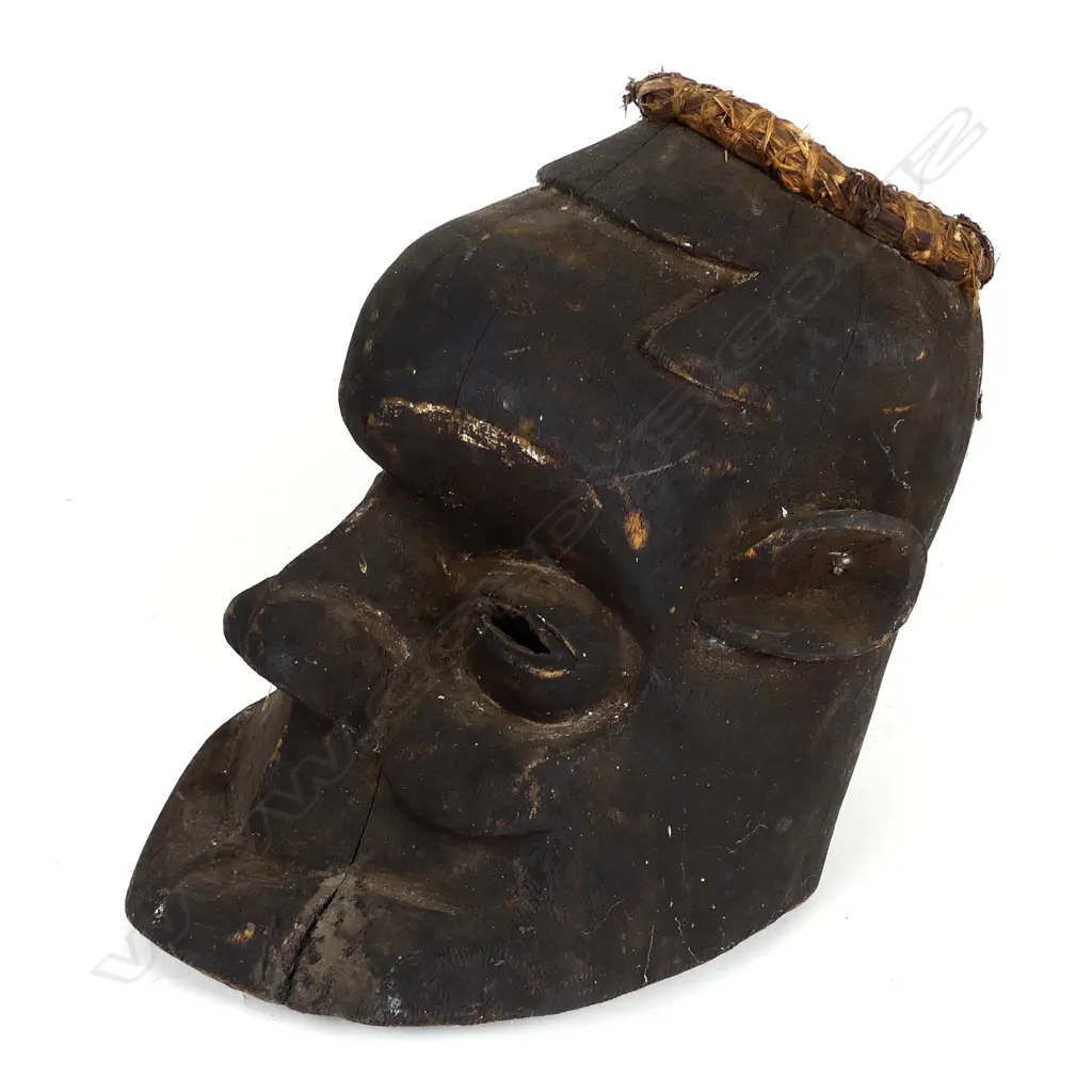 A large old African helmet mask Image 1++
