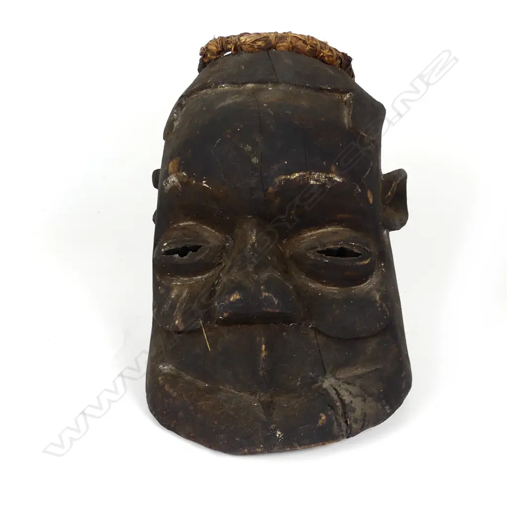 A large old African helmet mask Image 1++