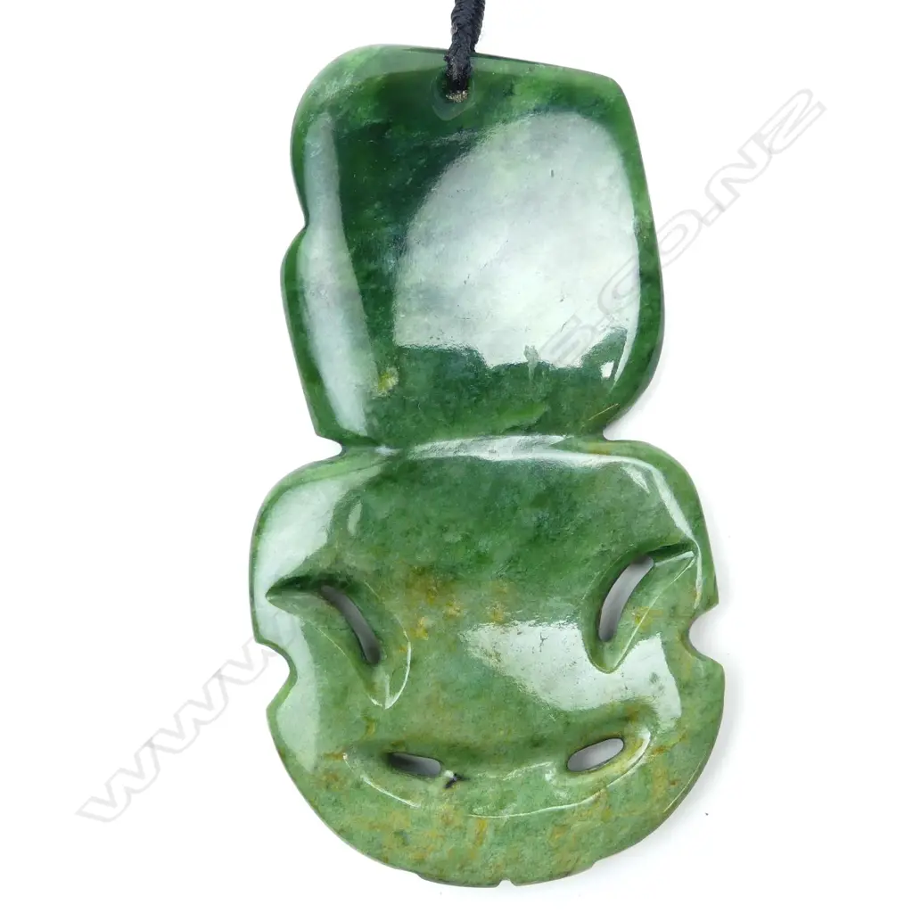 A contemporary pounamu hei tiki Image 1++