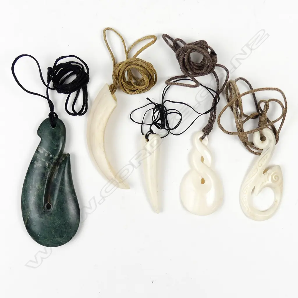Five carved pendants Image 1++