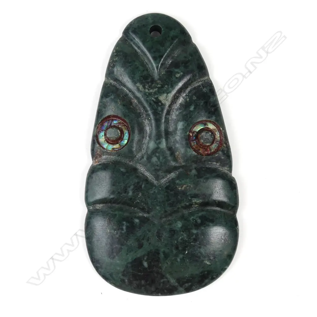 A pounamu koruru pendant carved by Mike Higgs Image 1++