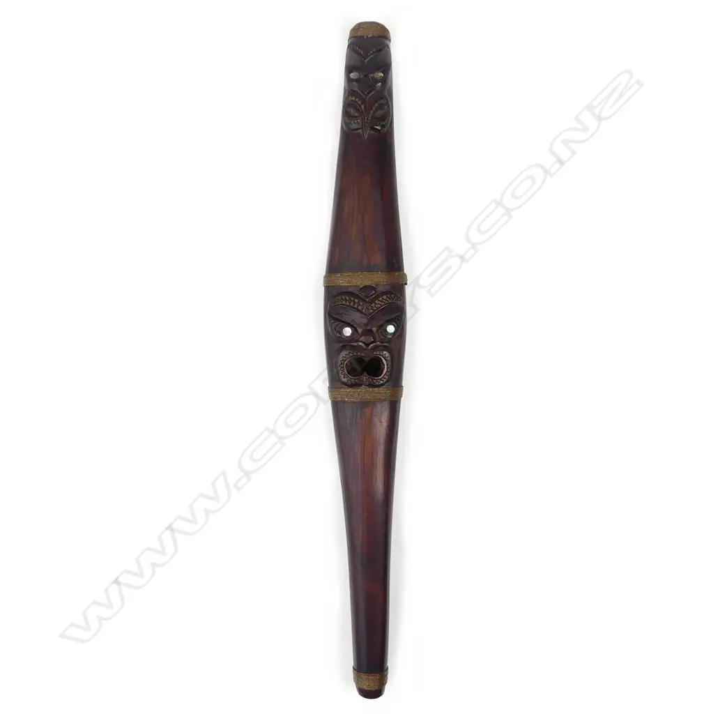 A mid-late 20thC Maori carved putorino (bugle flute) Image 1++