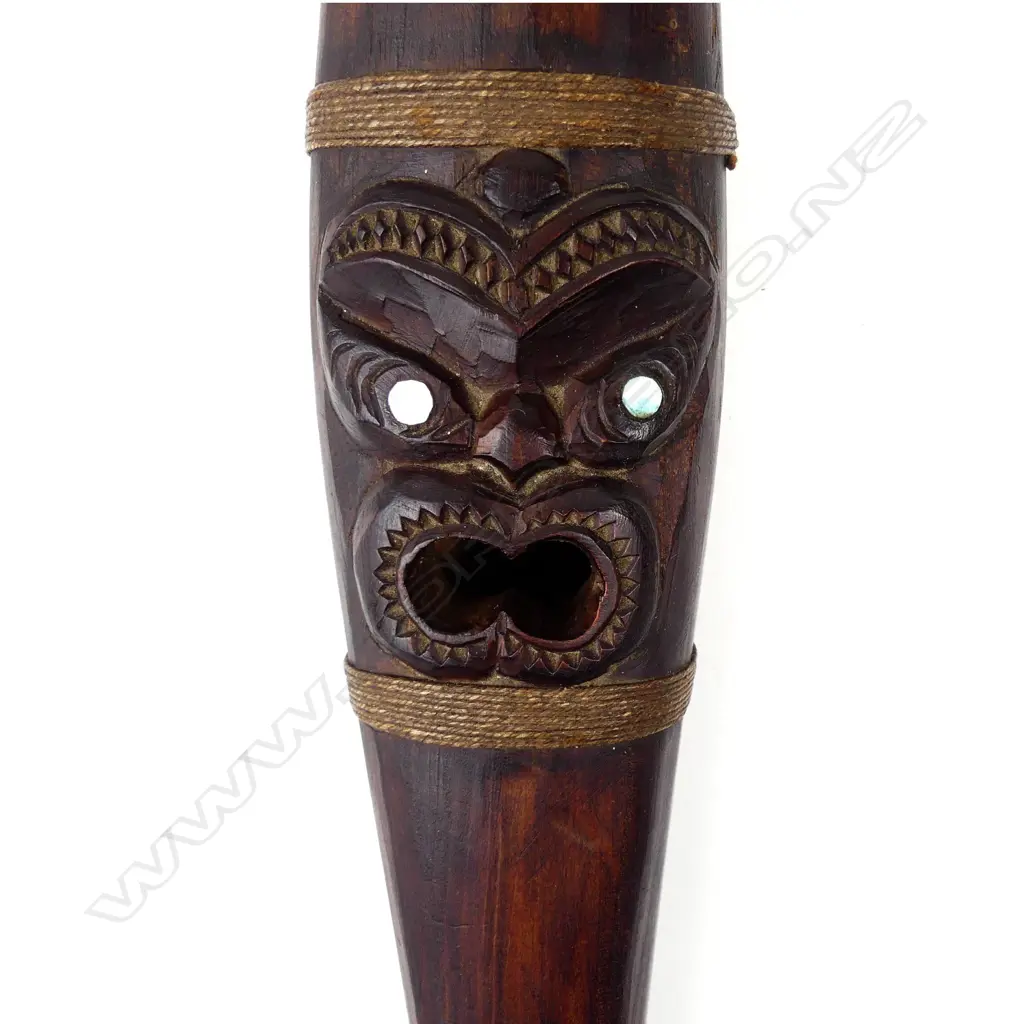 A mid-late 20thC Maori carved putorino (bugle flute) Image 1++