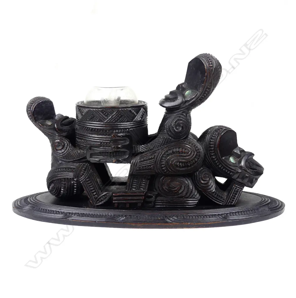 A rare late 19th early 20thC Maori carved kauri figure supported inkwell Image 1++