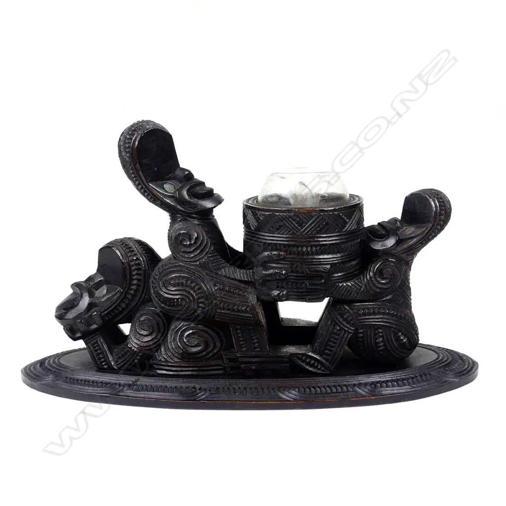 A rare late 19th early 20thC Maori carved kauri figure supported inkwell Image 1++