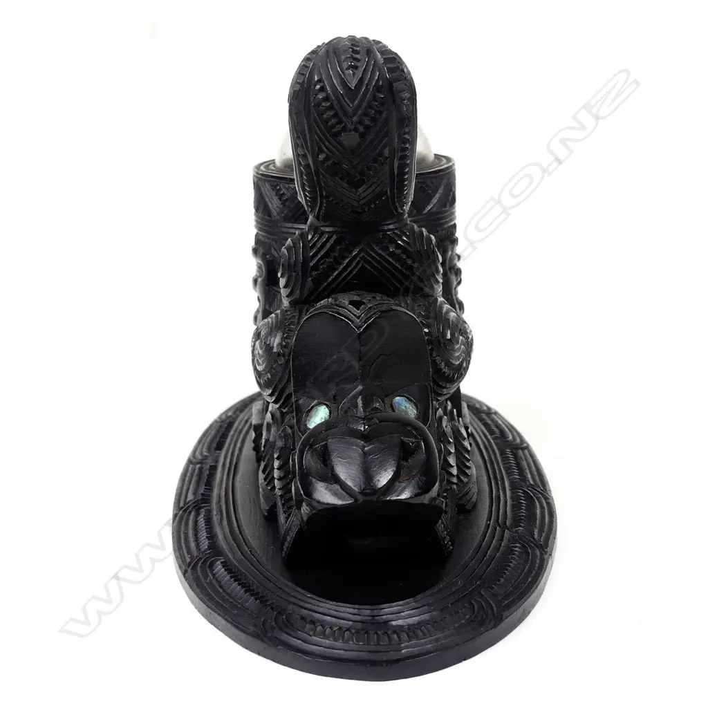 A rare late 19th early 20thC Maori carved kauri figure supported inkwell Image 1++