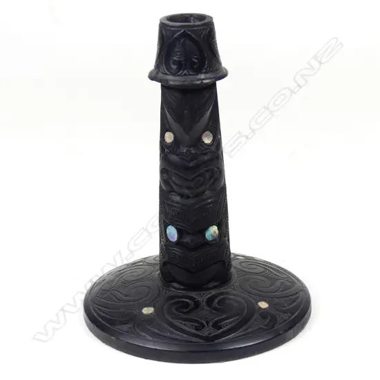 An early 20thC Maori carved candle stand