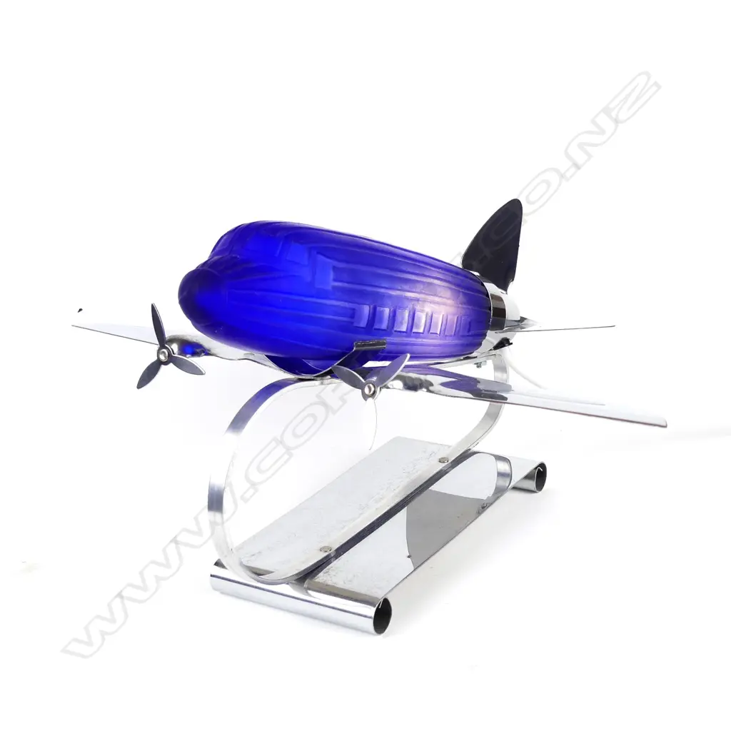 A reproduction Art Deco chrome and blue glass aeroplane desk lamp Image 1++