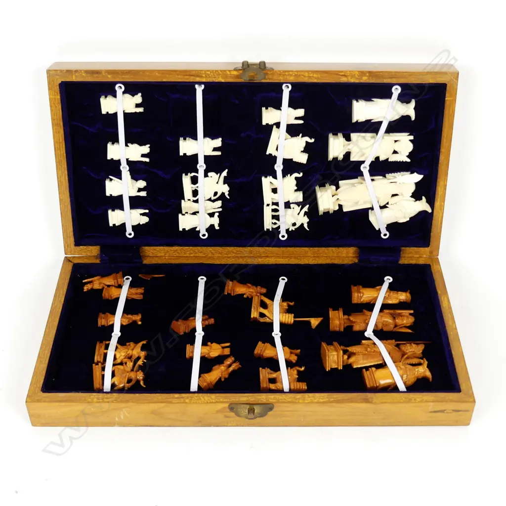A vintage carved ivory chess set Image 1++