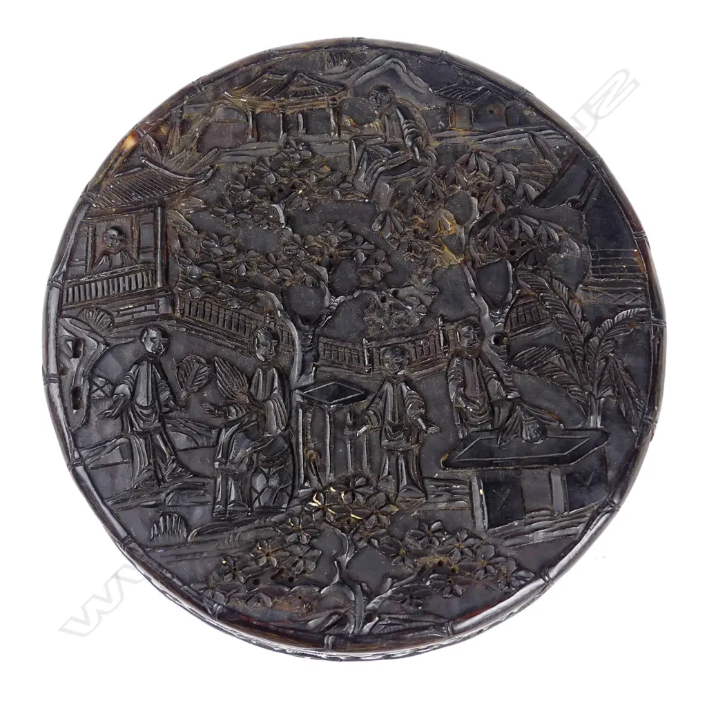 A finely Chinese carved tortoiseshell Qing period circular table snuff box Image 1++