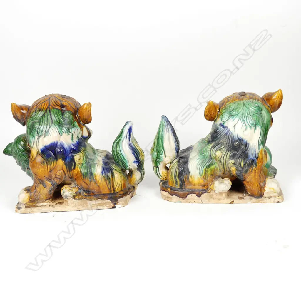 A pair of vintage Chinese roof tile finials Image 1++
