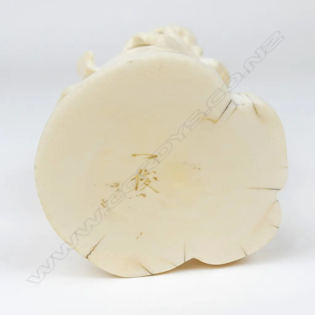 A Meiji period ivory figure of a fisherman Image 1++