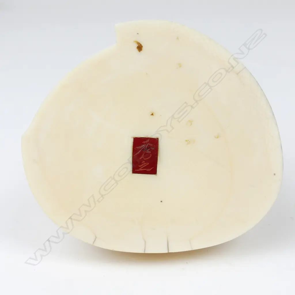 A Meiji period ivory figure of an elderly man Image 1++