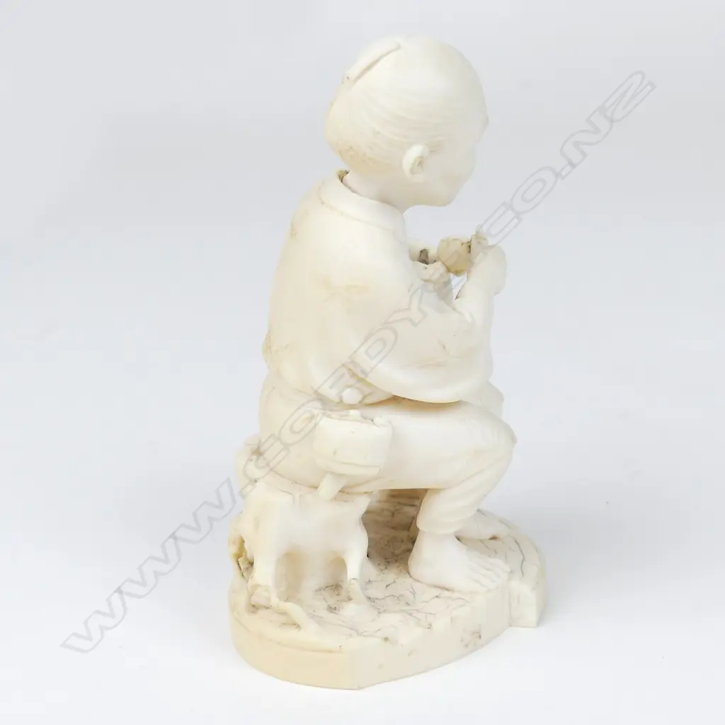 A Meiji period ivory figure of an elderly man Image 1++