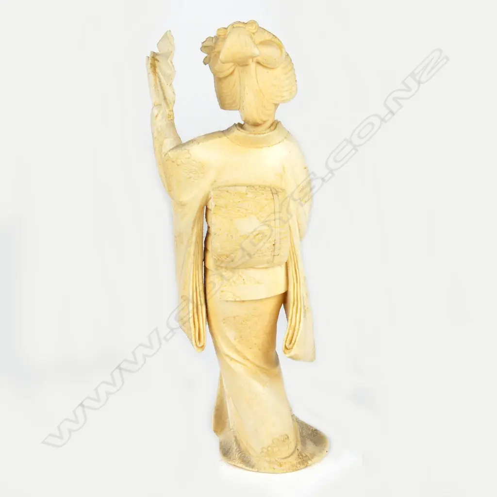 A Japanese Meiji period ivory figure of a woman Image 1++