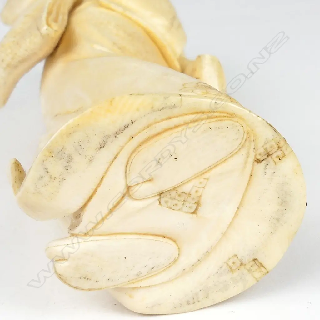 A Japanese Meiji period ivory figure of a woman Image 1++