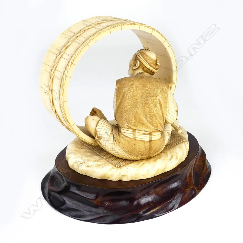 An outstanding Japanese Meiji period okimono of a barrel maker Image 1++