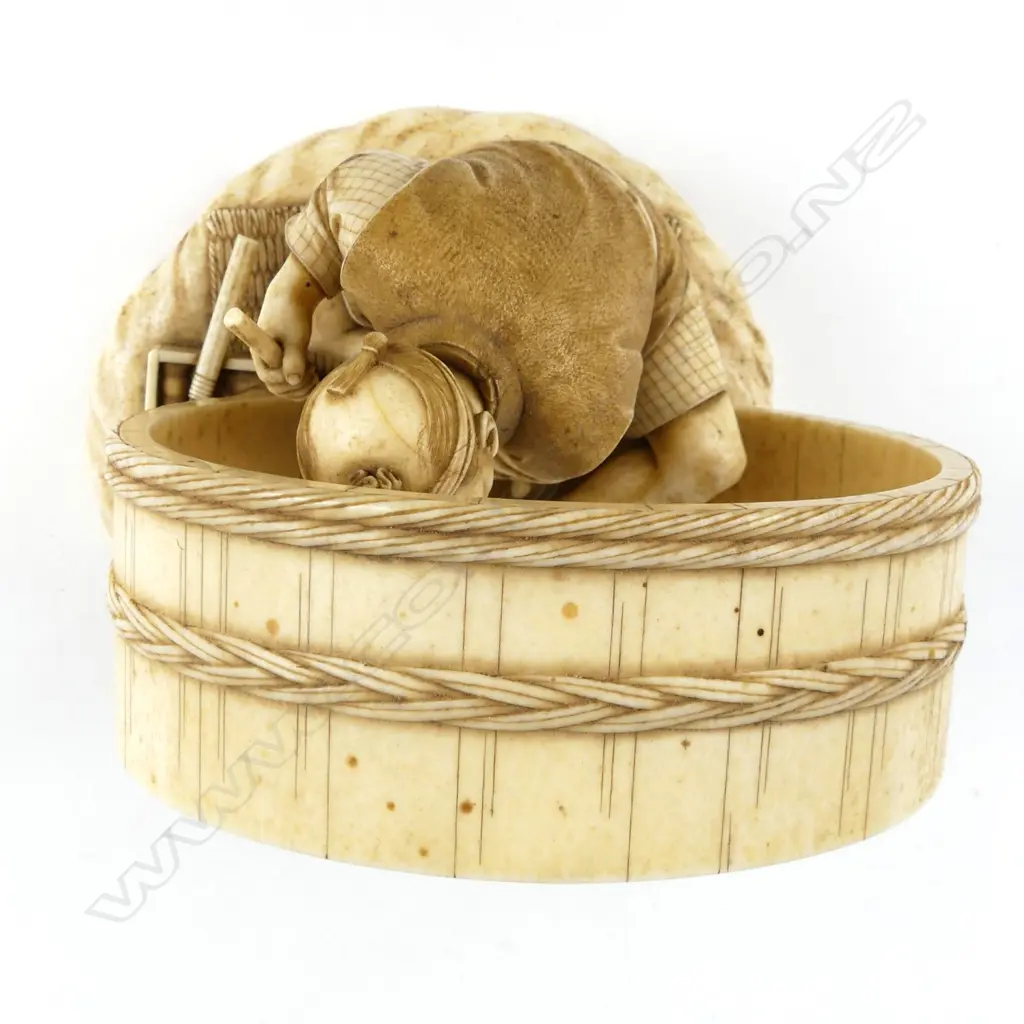 An outstanding Japanese Meiji period okimono of a barrel maker Image 1++