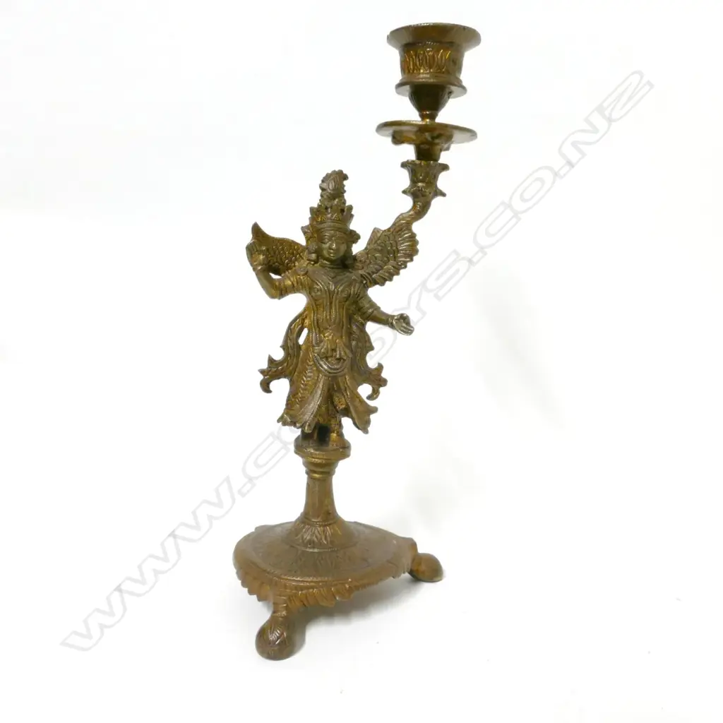 An Indian gilt metal candlestick Image 1++