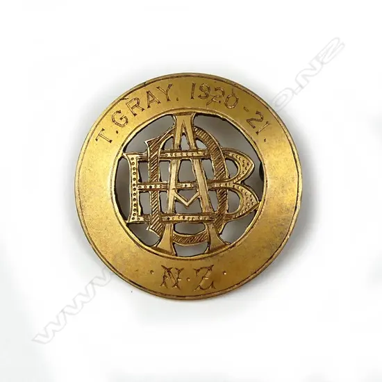 A 15ct. gilded yellow gold presentation bowling medallion
