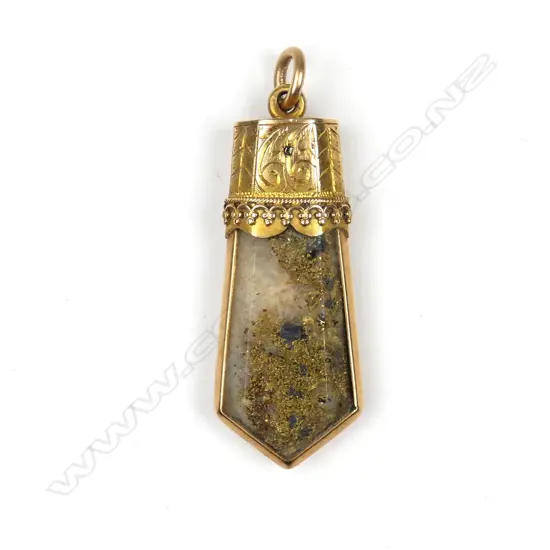 A colonial 15ct gold and gold quartz pendant