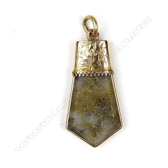 A colonial 15ct gold and gold quartz pendant