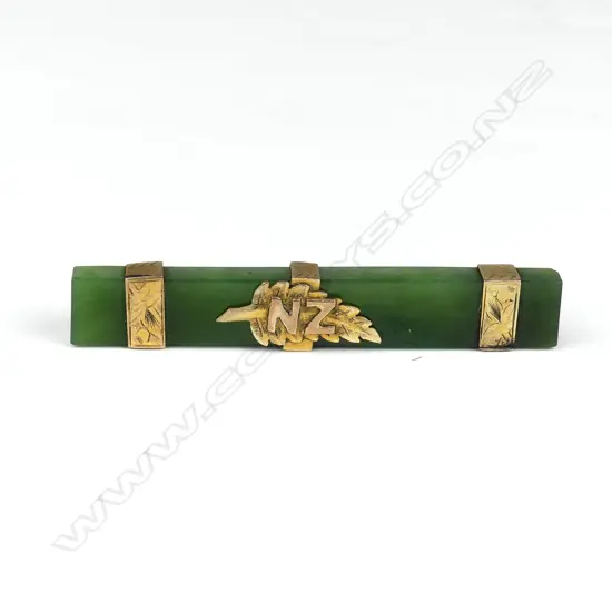 A colonial 9ct gold and greenstone bar brooch