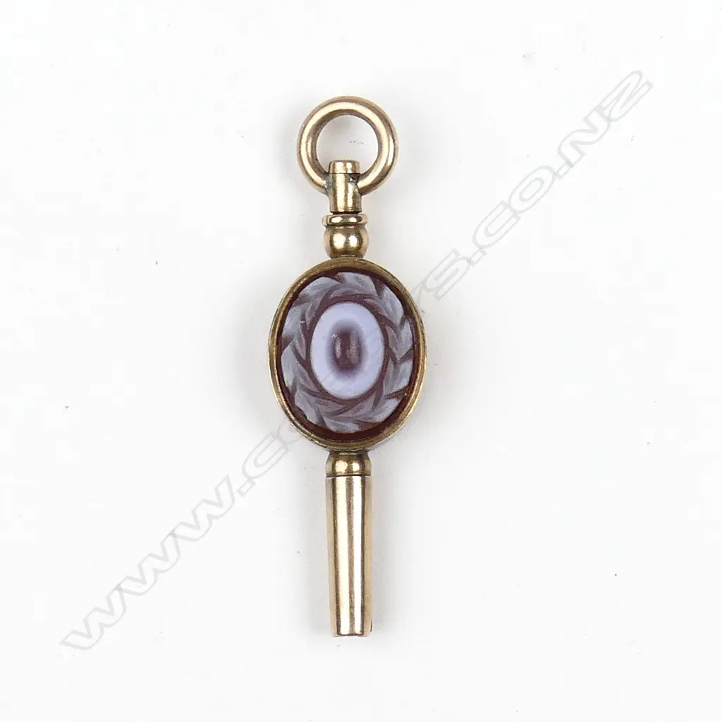 A 9ct rose gold watch key Image 1++