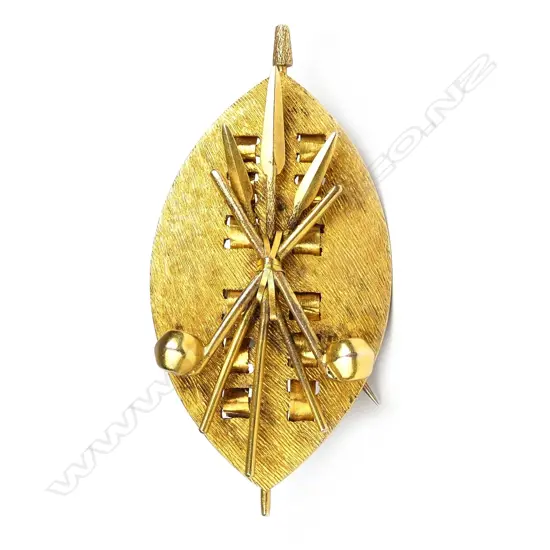 An early 20thC 18ct. yellow gold South African Zulu shield and weapons brooch