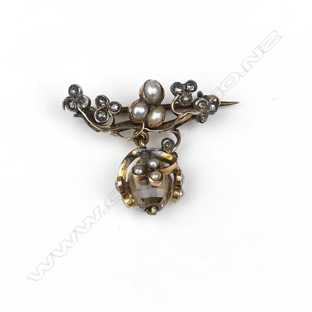An antique pearl and diamond brooch Image 1++