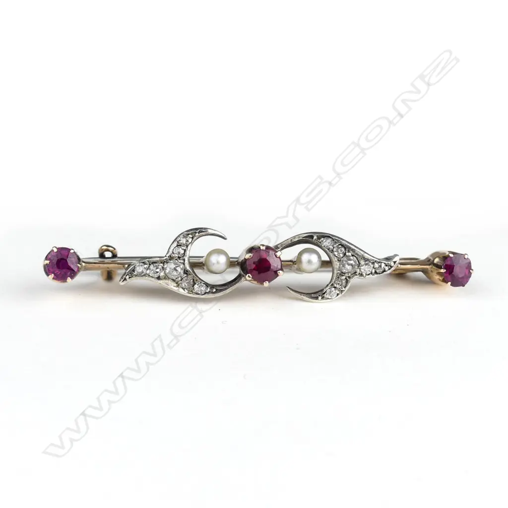 A 9ct gold garnet diamond and pearl bar brooch Image 1++