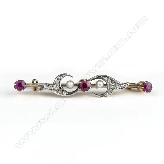 A 9ct gold garnet diamond and pearl bar brooch