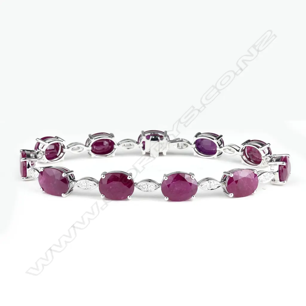An 18ct white gold ruby and diamond bracelet Image 1++