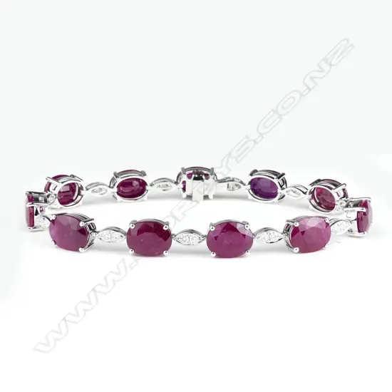 An 18ct white gold ruby and diamond bracelet