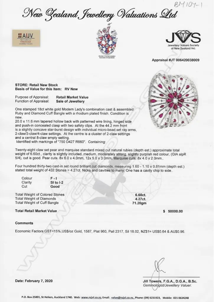 A spectacular 18ct. white gold ruby and diamond wide bangle Image 1++