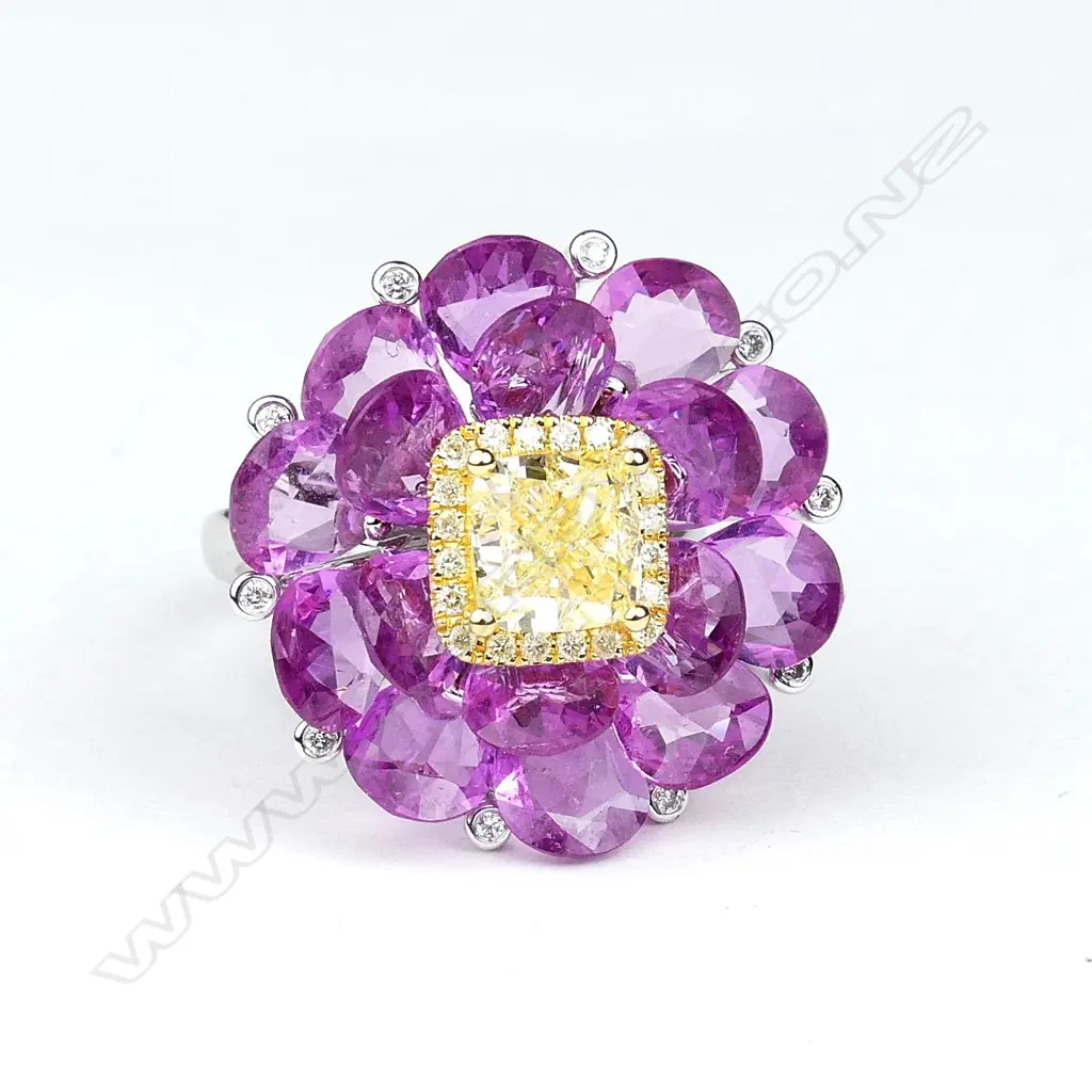 An impressive unique designer 18ct. white gold pink sapphire yellow and white diamond cocktail ring Image 1++