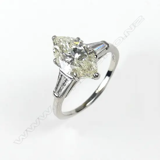 A platinum and diamond solitaire ring