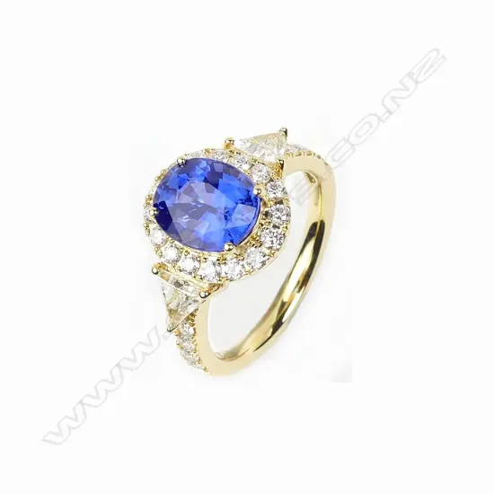 An 18ct gold natural 'cornflower blue' sapphire and diamond ring