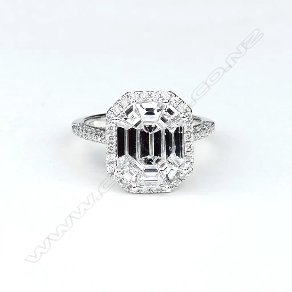An 18ct. white gold large diamond cluster ring Image 1++