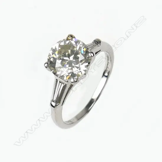 A platinum and diamond solitaire ring