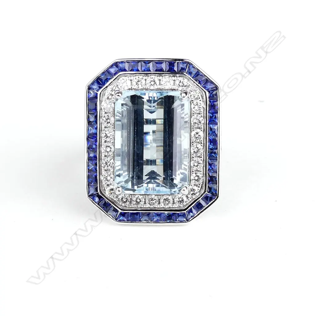 An 18ct white gold topaz sapphire and diamond ring Image 1++