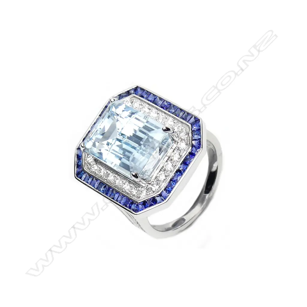 An 18ct white gold topaz sapphire and diamond ring Image 1++