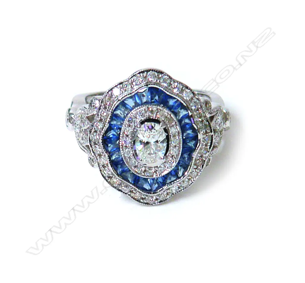 A modern Belle Époque-style 18ct. white gold sapphire and diamond cluster ring Image 1++