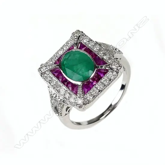 An 18ct white gold emerald ruby and diamond ring