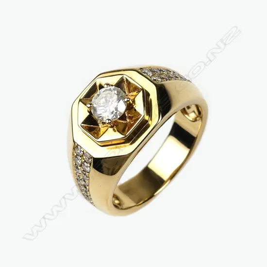 A 14ct yellow gold and diamond gents ring